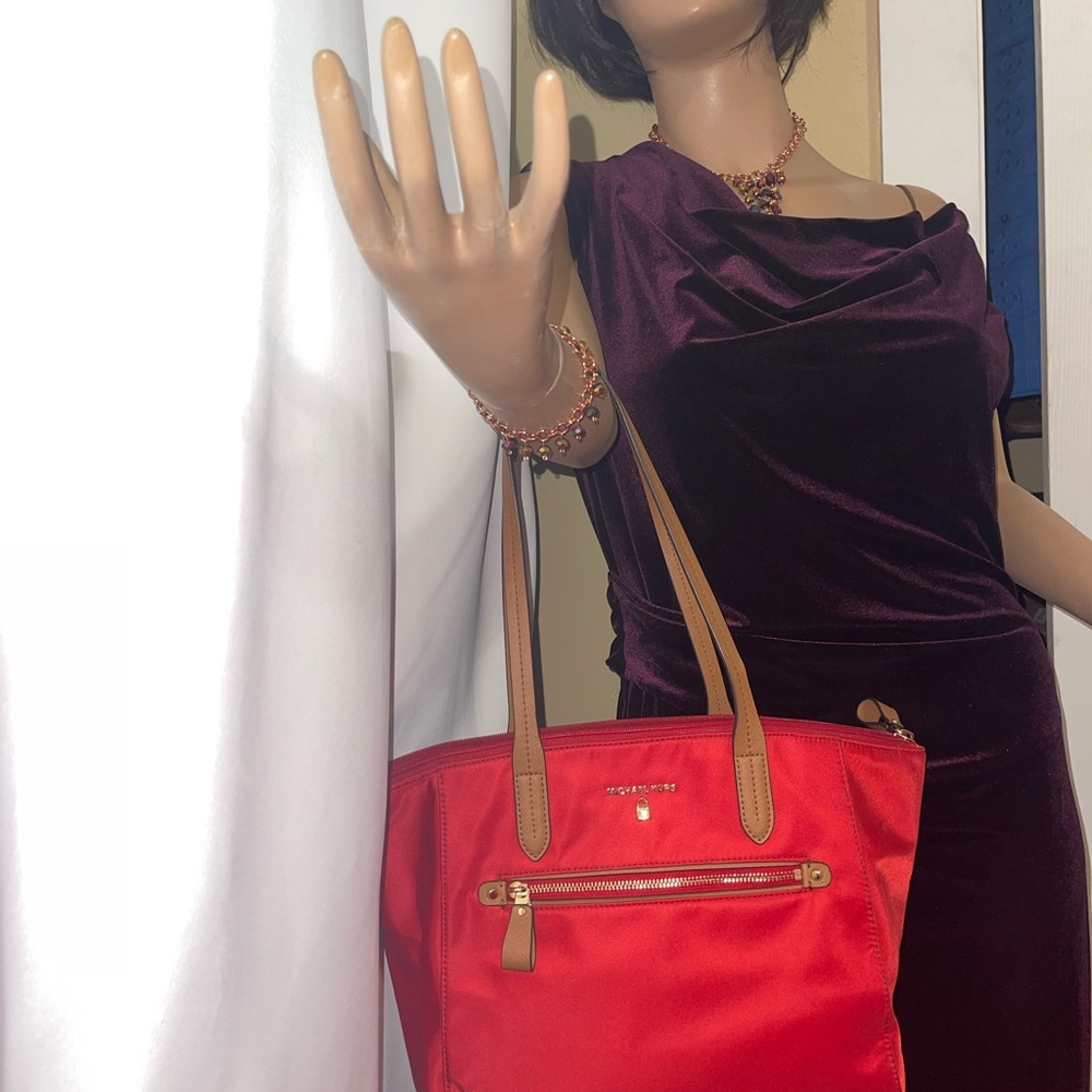 LOW START!!!!!!!
Michael Kors Red and Tan Interior